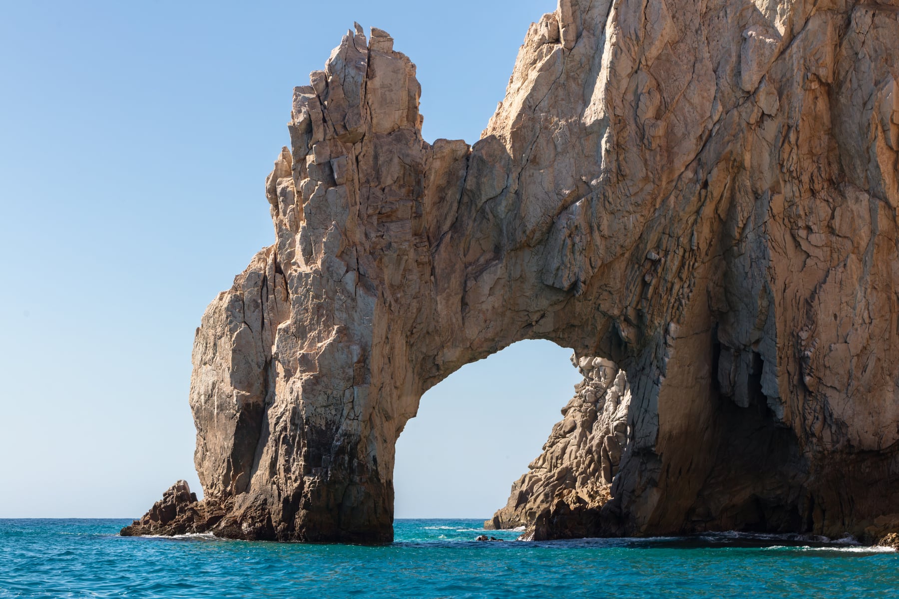 El Arco and rocky formations rising from the water at Land’s End in Cabo San Lucas.
